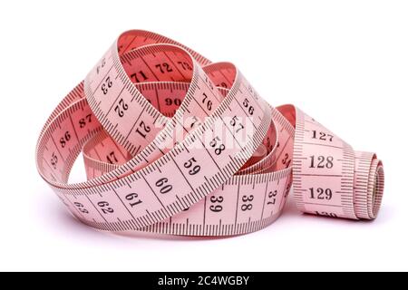 Pink measuring tape isolated on white background Stock Photo - Alamy