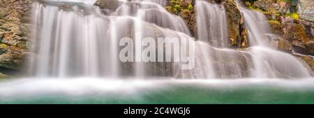 Panorama of Lillaz waterfalls near Cogne, Gran Paradiso national park, Aosta Valley in the Alps, Italy Stock Photo