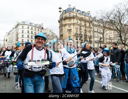 PARIS, FRANCE - FEBRUARY 23, 2020: Batuc’Active group playing drums and percussions at traditional Carnival in Paris. Stock Photo