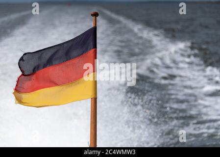 Hiddensee, Germany. 05th June, 2020. At the stern of the ferry Vitte the German flag is waving. Credit: Stephan Schulz/dpa-Zentralbild/ZB/dpa/Alamy Live News Stock Photo