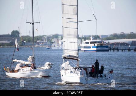 Rostock, Germany. 14th June, 2020. Sailors sail with their sport boats on the Warnow off Rostock. Credit: Nordlicht Rostock/dpa-Zentralbild/ZB/dpa/Alamy Live News Stock Photo