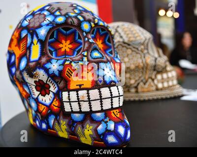 Colourful skull from mexican traditional huichol bead art symbol of the day of the dead. Dia de los Muertos Stock Photo