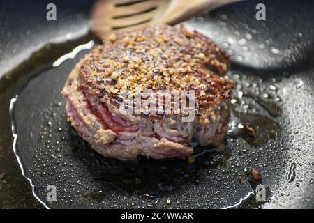 cooking ground beef in a pan Stock Photo