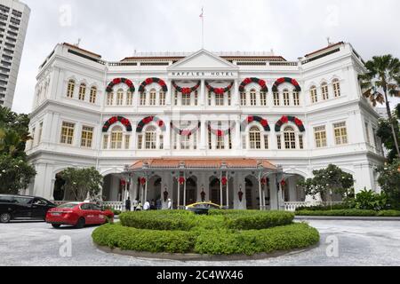 Raffles Hotel exterior decorated for Christmas in Singapore, Asia Stock Photo