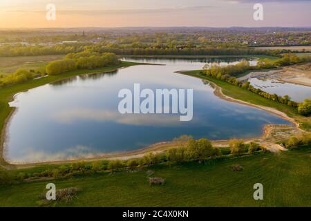 A man made lake, the end result of large scale gravel extraction near Witney in West Oxfordshire, UK Stock Photo