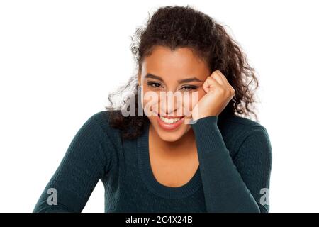 portrait of young beautiful happy dark-skinned woman on a white background Stock Photo