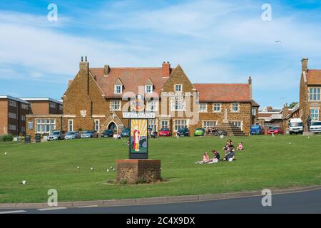 Hunstanton Norfolk town, view in summer of people relaxing on Cliff Parade in the seaside resort of Hunstanton on the north Norfolk coast, England, UK Stock Photo