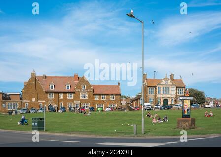 Hunstanton Norfolk town, view in summer of people relaxing on Cliff Parade in the seaside resort of Hunstanton on the north Norfolk coast, England, UK Stock Photo