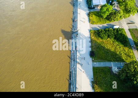 Aerial view of high water level in Vistula river near Warsaw, Poland. View on river boulevards, a popular place among Warsaw residents to spend their Stock Photo