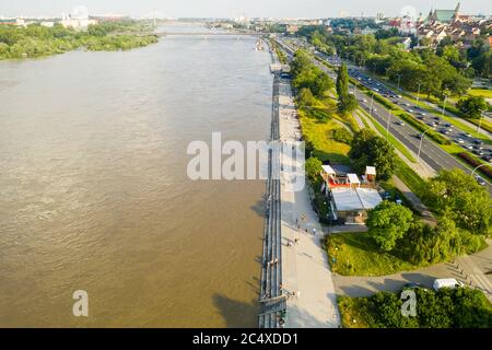 Aerial view of high water level in Vistula river near Warsaw, Poland. View on river boulevards, a popular place among Warsaw residents to spend their Stock Photo