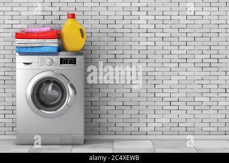 Detergent Bottle and Pile of Clothes over Modern Silver Washing Machine in front of brick wall. 3d Rendering Stock Photo