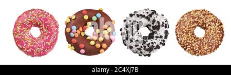 glazed round donuts set with sprinkles isolated on white background. Top view. Clipping path included Stock Photo