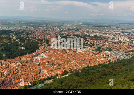 BRASOV, ROMANIA - Circa 2020: aerial view of old town center in Brasov Romania. Concept of old medieval town in eastern center Europe. Tourist must se Stock Photo