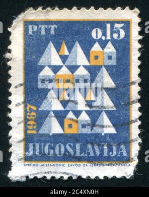 YUGOSLAVIA - CIRCA 1967: stamp printed by Yugoslavia, shows houses, circa 1967. Stock Photo