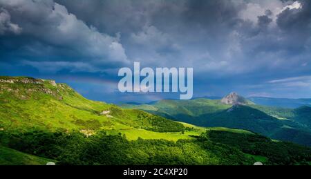 The mountains Puy Griou and Monts du Cantal. Auvergne Volcanoes Regional Nature Park, Cantal, France, Europe Stock Photo