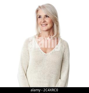 Beautiful elderly woman portrait isolated on white. Senior lady is looking away and smiling Stock Photo