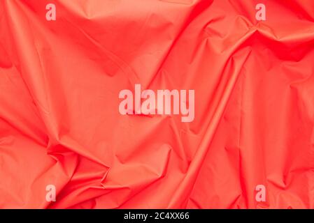 Red polyester or satin fabric, abstract background or texture Stock Photo