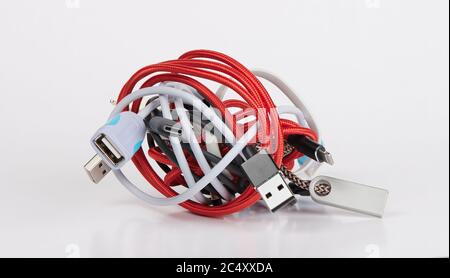 tangled wires. bundle of computer cables on white background Stock Photo