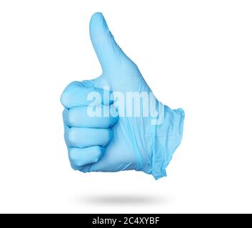 Doctor hand in blue sterile gloves is showing thumbs up sign isolated on white background with clipping path Stock Photo