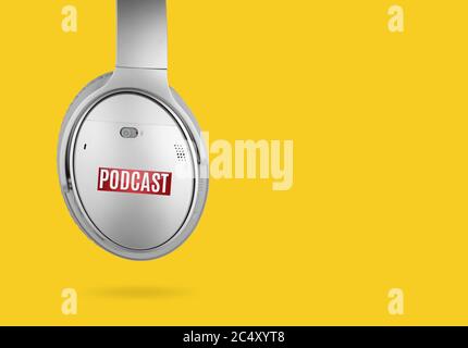 Modern headphones with podcast icon isolated on yellow background. Stock Photo