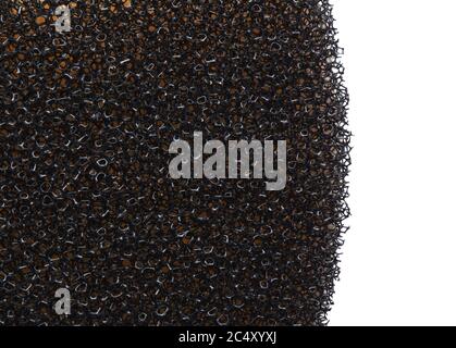 Black sponge texture background close up. Stock Photo