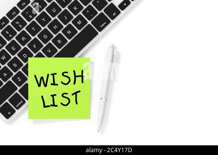 Sticky Note Paper with Wish List Sign, White Pen and Keyboard on a white background. 3d Rendering Stock Photo