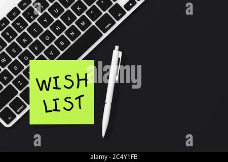 Sticky Note Paper with Wish List Sign, White Pen and Keyboard on a black background. 3d Rendering Stock Photo