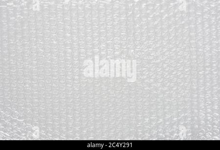 White bubble wrap packing texture. Air cushion film background. Stock Photo