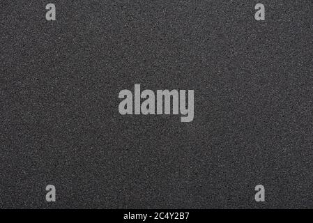 Black sponge texture. foam rubber background. Stock Photo