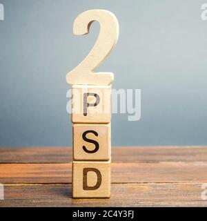 Wooden blocks with the word PSD 2 - Payment Services Directive. European Commission Banking Directive. Increase payment efficiency Stock Photo