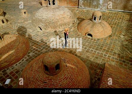 Female Traveler Enjoying the Iconic Medieval Sulfur Baths in the Old Tbilisi of Georgia Stock Photo