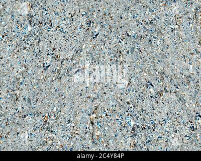 grey aluminium foil texture useful as a background, with color light reflection Stock Photo