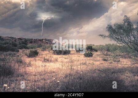 Lightning and thunderstorm over the prairie in the Palo Duro Canyon Stock Photo