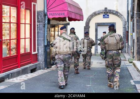 Clermont-Ferrand, France - December 11 2019: French soldiers patrolling near in the city center in order to spot any suspicious activities. Stock Photo