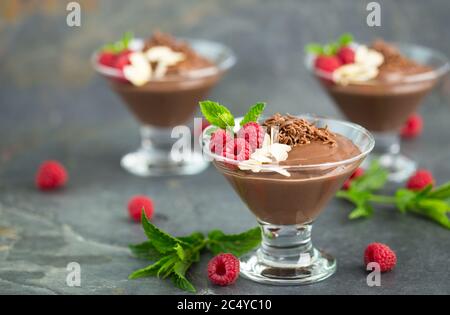 Chocolate mousse with raspberry, mint and almonds Stock Photo