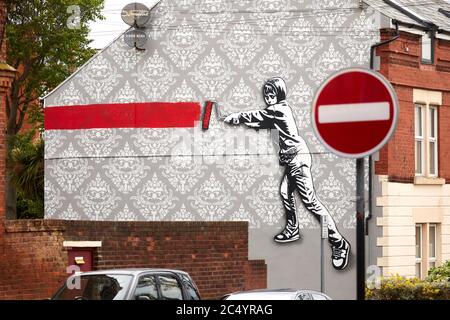 New Brighton Wirral in Merseyside, England. street art on gable end and no entry sign Stock Photo