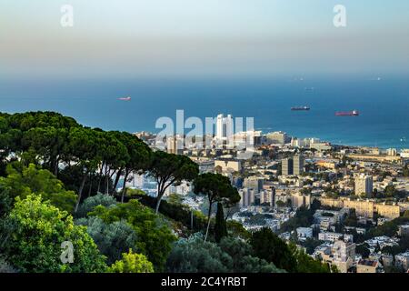 Panoramic view of the downtown Haifa and sea with ships in sunny summer day from upper terrace of Bahai gardens. Haifa, Northern Israel Stock Photo