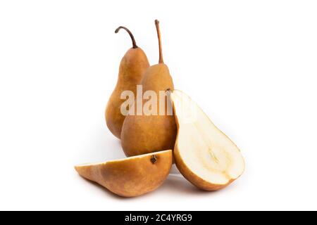 a group of Bosc pears with one pear cut in half isolated on white Stock Photo