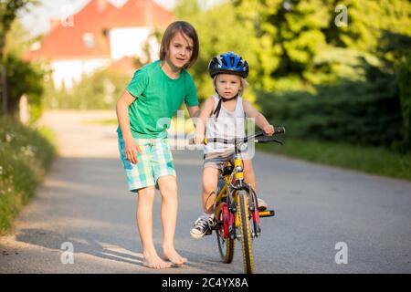 Teaching an older kid cheap to ride a bike