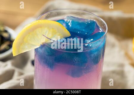 Homemade Butterfly Pea Tea Lemonade with Blue Ice Stock Photo