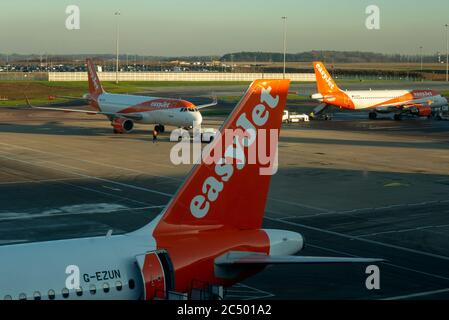 Three Easyjet Airbus A320-214 Aircraft Pictured In A Terminal Under The 