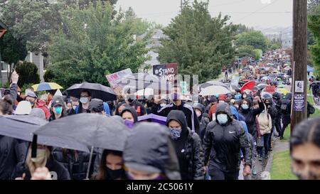 Seattle; march; usa; peaceful protests; holding signs; person; man; male; human; urban; black lives matter; racist; authority; rally; demonstration; c Stock Photo