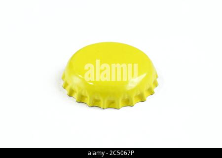 A simple yellow cap isolated on white background. Metallic cap for glass bottle Stock Photo