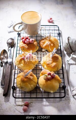 Sweet rolls with morning coffee.Dessert decorated with red currant.Healthy food. Stock Photo