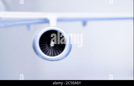 model of the turbofan engine on the airplane wing Stock Photo