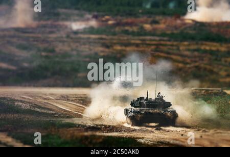 Shot from a tank gun with a smoke ring, the frame of military