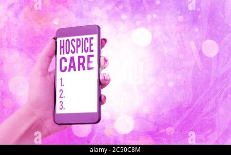 Text sign showing Hospice Care. Business photo showcasing focuses on the palliation of a terminally ill patient s is pain Modern gadgets with white di Stock Photo