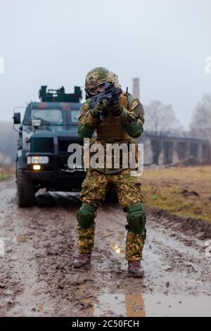 modern ukraine soldier patrolling with a machine gun in his hands Stock ...