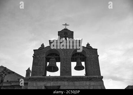 Bells on the Cathedral of Santa Maria la Menor. It is the oldest cathedral in the Americas. Santo Domingo, Dominican Republic. Stock Photo