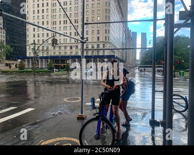 New York, New York, USA. 29th June, 2020. (NEW) A Short heavy rainfall in New York City. June 29, 2020, Manhattan, New York, USA: Another short heavy windy rainfall in New York City catching some people unaware . Credit: Niyi Fote /Thenews2. Credit: Niyi Fote/TheNEWS2/ZUMA Wire/Alamy Live News Stock Photo